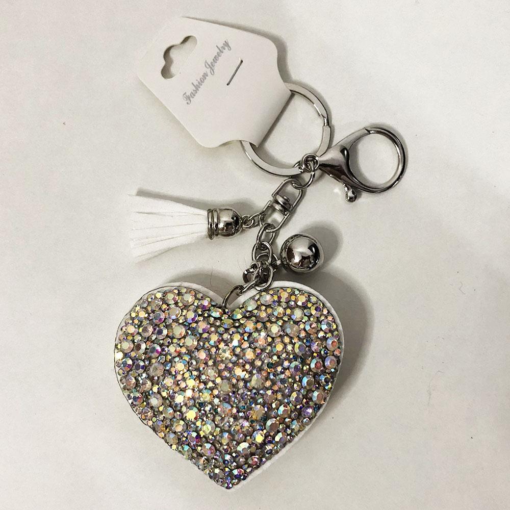 Брелоки із замші блискучі в формі серця. Колір білий