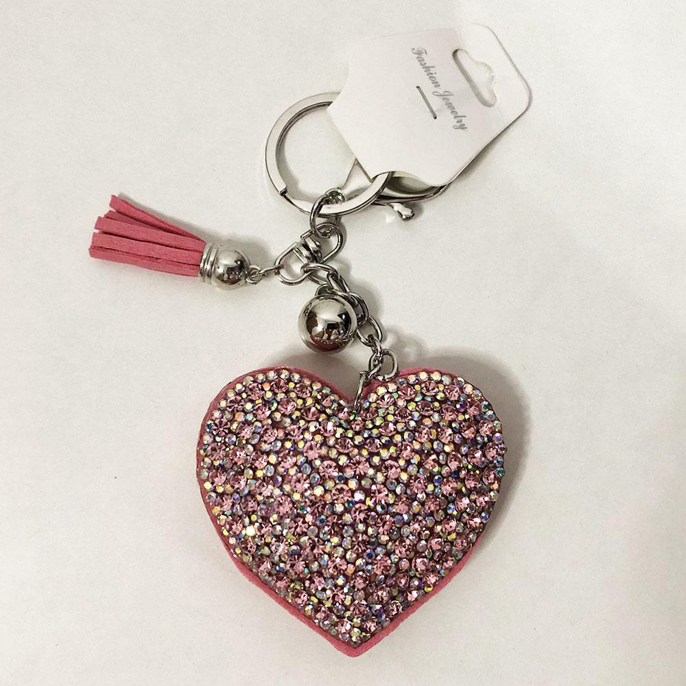 Брелоки із замші блискучі в формі серця. Колір рожевий